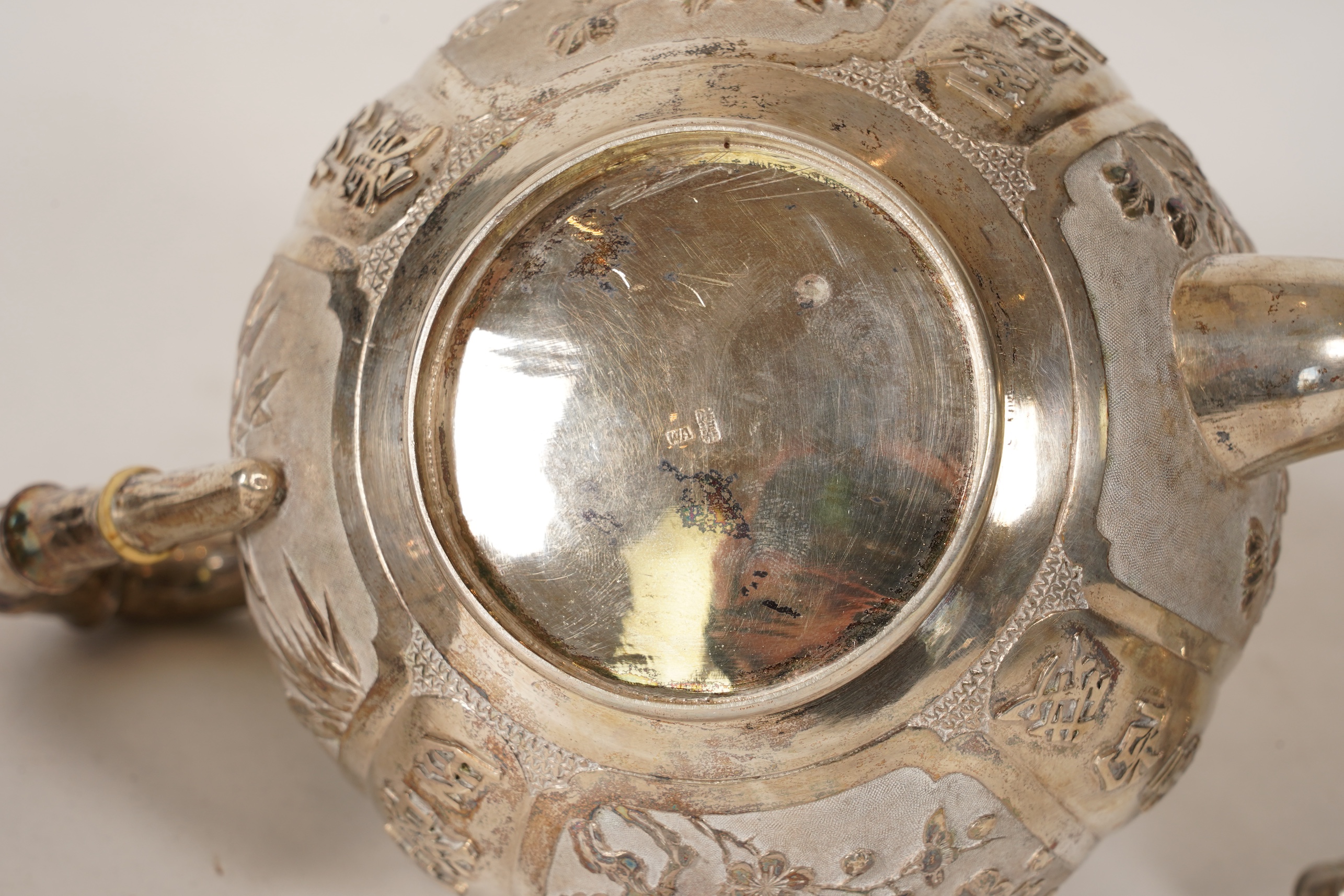 A late 19th/early 20th century Chinese Export white metal three-piece tea set, maker's mark WA